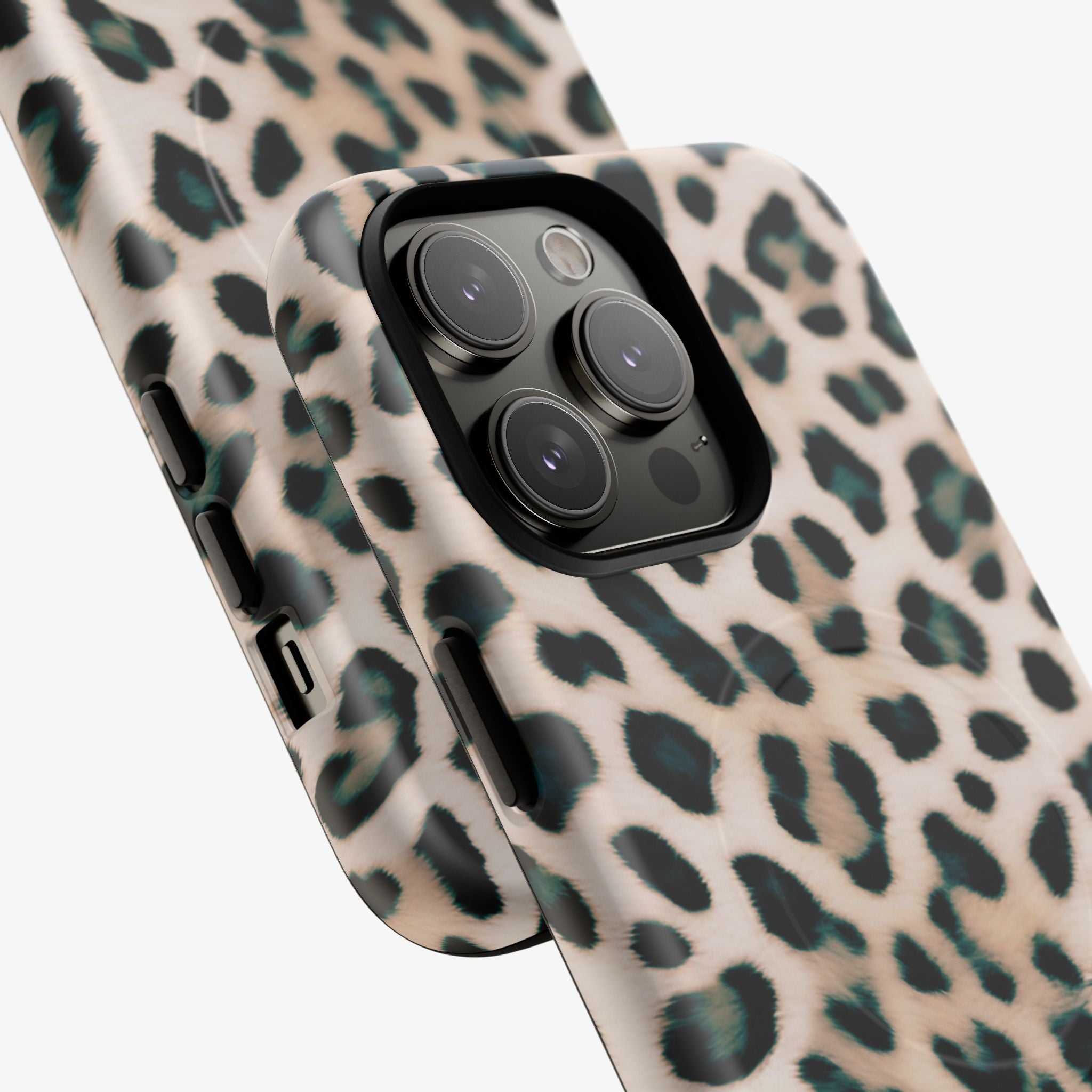 Close-up view of two smartphones featuring Safari (Dune) | Signature Series Phone Case (MagSafe) with a stylish leopard print design in muted tones, highlighting precise cutouts and camera protection.
